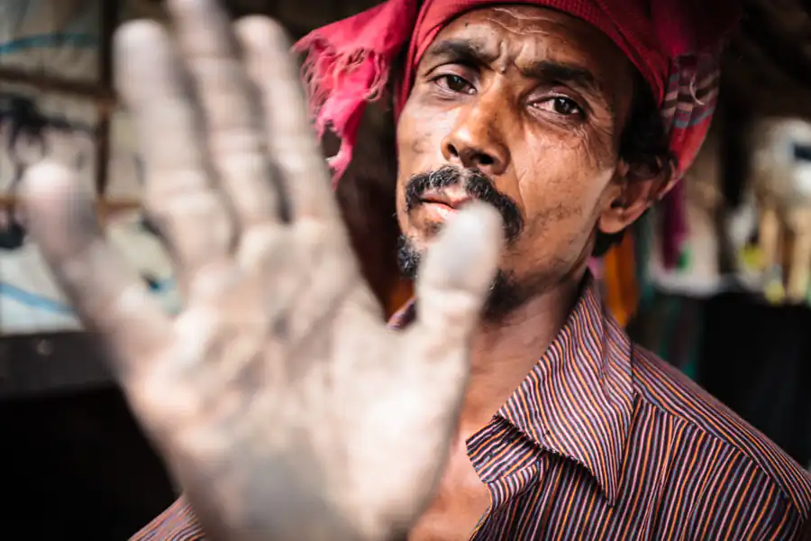 Portrait of a young man, Karwan Bazar slum, Dhaka, Bangladesh, Indian Sub-Continent, Asia