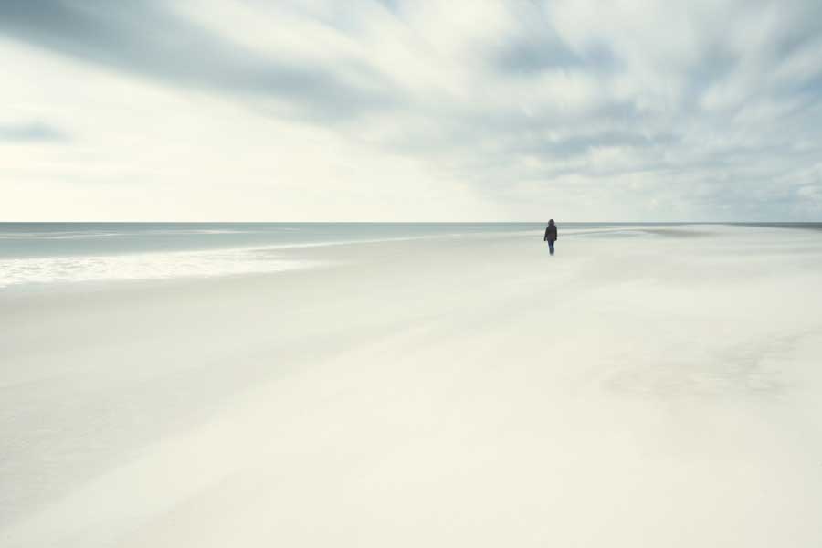 women standing on ocean