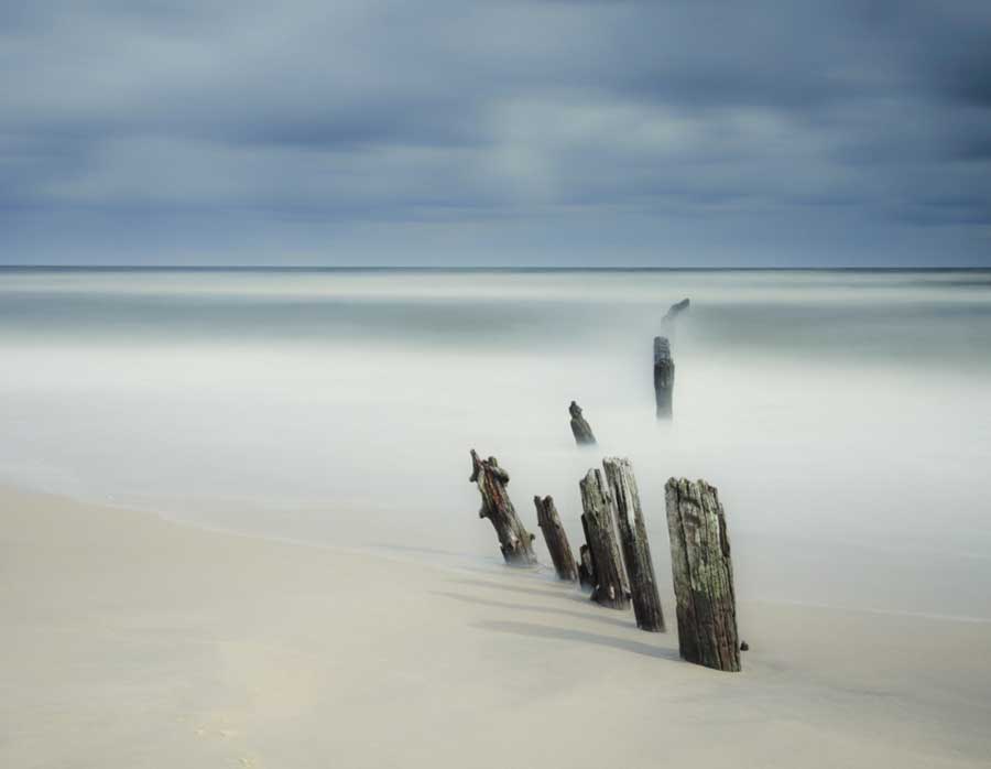 wooden breakwater on the ocean