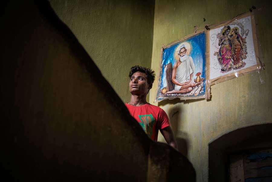 Rajib Roy (17) at his sonagachi residence in Kolkata where he lives with his mother and younger brother. Rajib is a promising footballer and he is a product of Durbar Sports Academy. He got selected by Manchester United Football Club to get trained at Manchester facility last year. Now he is playing for East Bengal junior team.