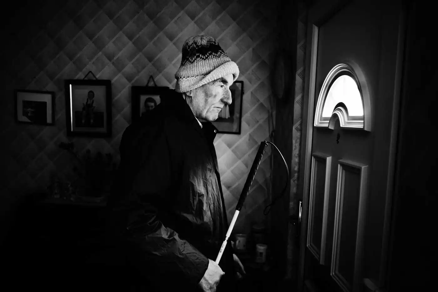 Mentally preparing himself to venture and brave the world outside the safety of the front door again.