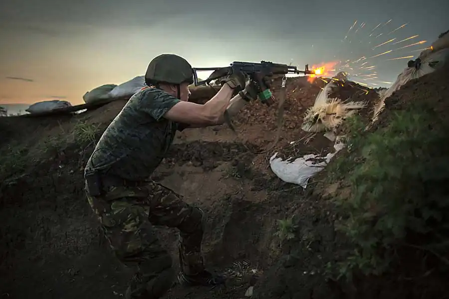 Ukrainian fighter engaged in battle with pro-Russian separatists on the frontline at Shirokino site, June 24th 2015, East of Ukraine, Photographer: Dmitri Beliakov
