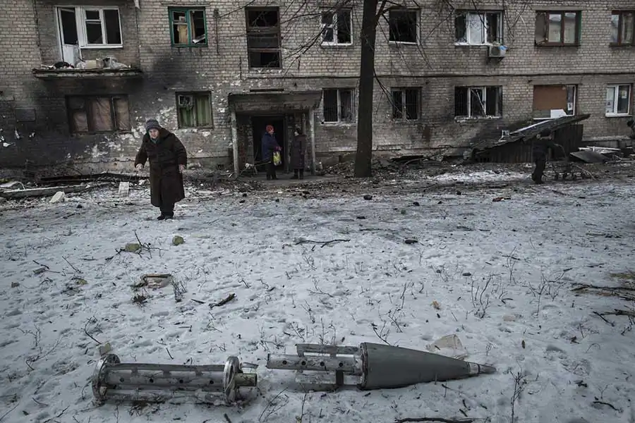 Remnants of cluster munition rocket lay in the yard of densely populated area after battle for Debaltsevo town, Eastern Ukraine, February 20 2015 Photographer: Dmitri Beliakov/ for The Sunday Times