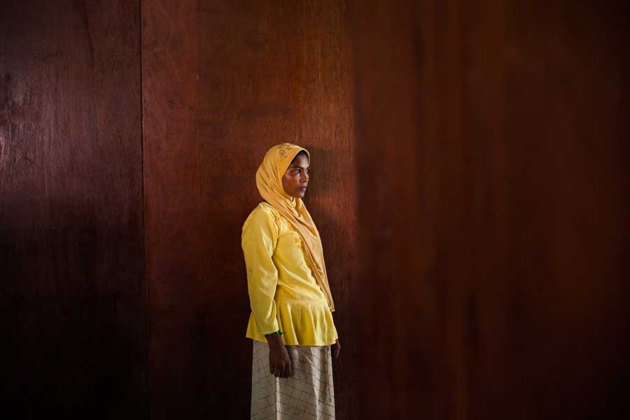 FK (20) , a Rohingya refugee from Myanmar, at a temporary shelter in Bayeun, East Aceh, Indonesia. She was on the boat with her sister. On May 20th 2015, around 400 refugees and asylum-seekers stranded at sea for months were rescued by Indonesian Fisherman in Julok, Aceh province, Indonesia.