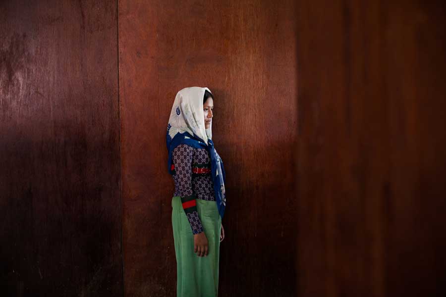 UK (14), a Rohingya refugee from Myanmar, at a temporary shelter in Bayeun, East Aceh, Indonesia. She was on the boat with her cousin. On May 20th 2015, around 400 refugees and asylum-seekers stranded at sea for months were rescued by Indonesian Fisherman in Julok, Aceh province, Indonesia.