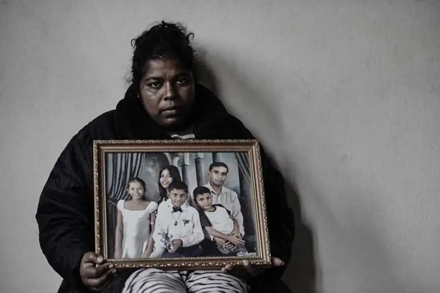 Woman from Sri Lanka who lives with her three children as illegal refugees in Kathmandu, Nepal. Her husband is imprisoned at the Galle prison in Sri Lanka. The story cannot be told here due to security concerns for the family.