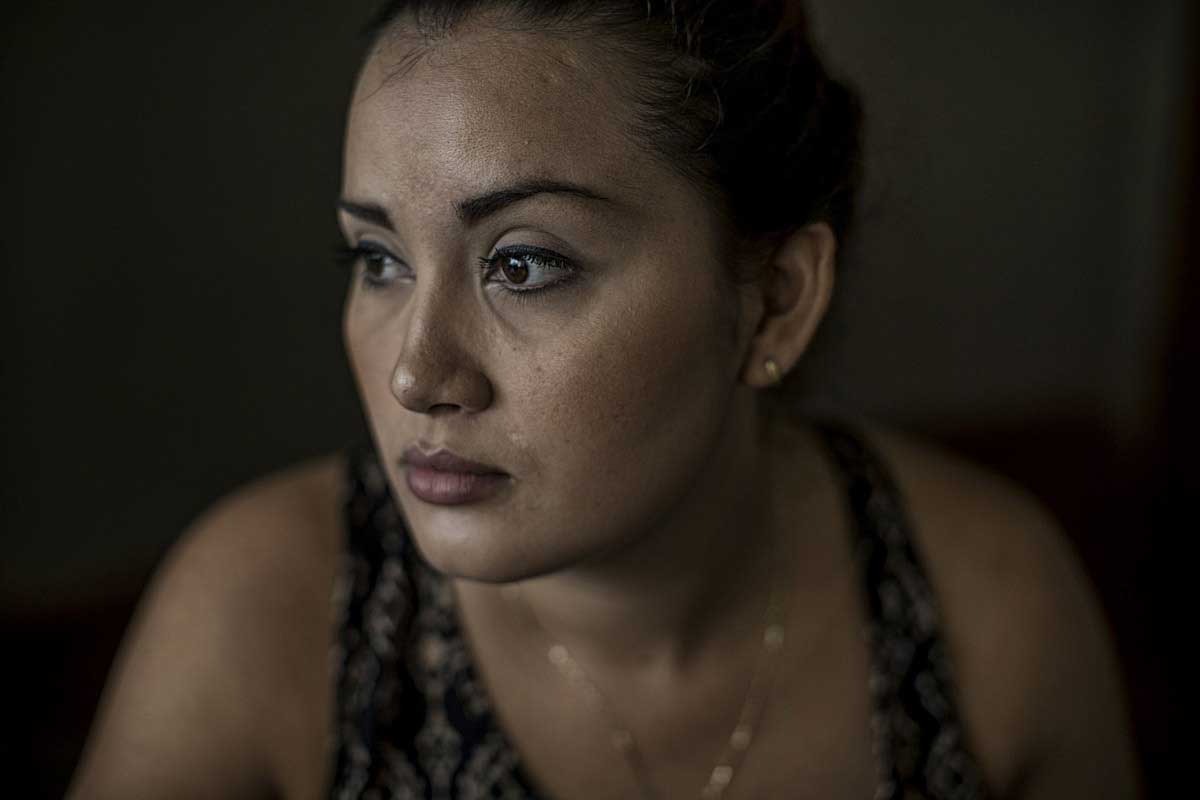 San Luis Del Carmen, Chalatenango, El Salvador-May 2016: Milagro Castro, 24 years old and a few weeks shy of 5 months pregnant contracted Zika at 9 weeks and lives in fear the she will give birth to a deformed baby. But she puts her faith in god. Pregnant women in today's El Salvador face a whole host of challenges from the threat of the mosquito born illness, Zika which has been linked to the grave condition of microcephaly in newborns, to the constant threat of gang violence with one of the highest murder rates in the world, to an increasing rape epidemic. However the most important threat to women's reproductive rights is by far the State's criminal ban on abortion. Doctors and nurses are trained to spy on women's uteruses in public hospitals, reporting any suspicious alteration to the authorities and provoking criminal charges which can lead to between 6 months to 7 years in prison. It is the poorer class of women who suffer the most as doctors in private hospitals are not required to report. Roughly 25 women are serving 30 to 40 year sentences on homicide charges for allegedly killing their newborn children. Although the women's stories, most of which resemble premature births or late term miscarigaes are often dismissed in trials, laced with moral accusations, based little on the consitution and scientific facts. ©Nadia Shira Cohen