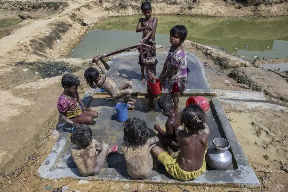 Rohingya children from Myanmar take their baths in Kutupalong cam.