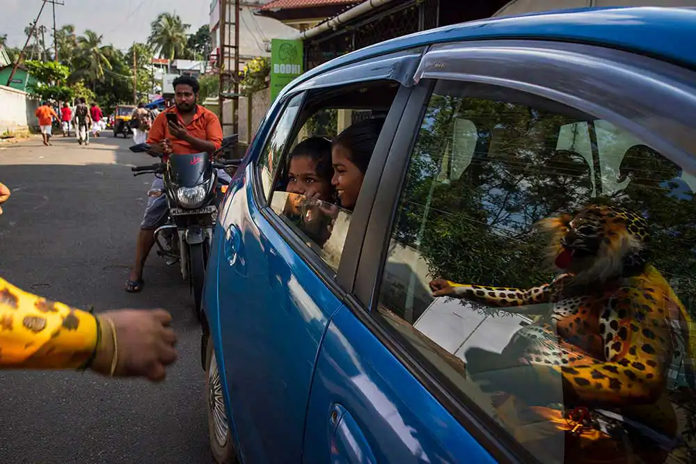 Pulikali – a folk art of Kerala by Rishi Devarajan