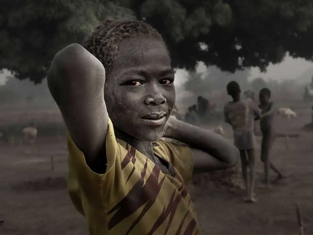 Being a child in a mundari camp by Elena Molina